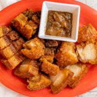 Lechon Kawali · Pork? belly boiled in seasoned water then deep-fried to a crisp. Served with our homemade sa...