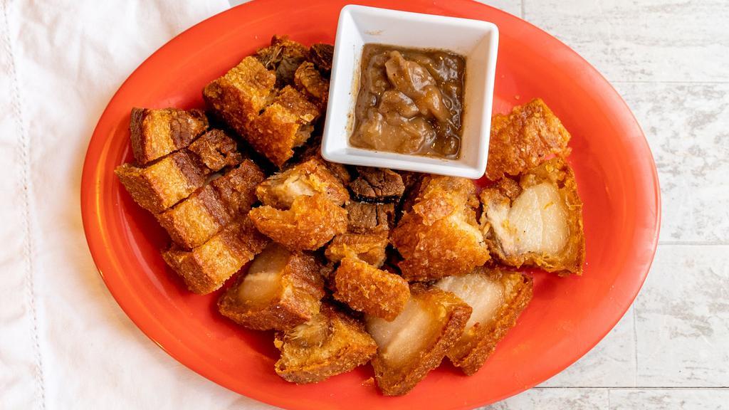 Lechon Kawali · Pork? belly boiled in seasoned water then deep-fried to a crisp. Served with our homemade sauce.