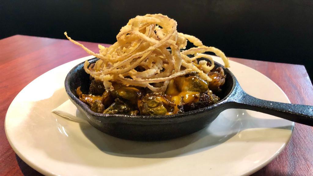 Crispy Brussels Sprouts · Miso maple mustard aioli and crispy onions.  (Vegetarian)