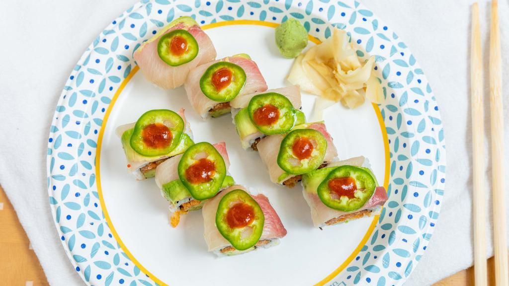 Kiss The Fire Maki (8 Pieces) · Spicy. Raw & undercooked. Spicy salmon, avocado inside, top with yellowtail, avocado, jalapeño, and spicy sauce, soybean paper.