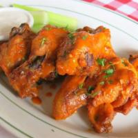 Authentic Buffalo Wings · Frank's Red Hot, Bleu Cheese, Celery Sticks