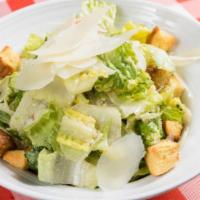 Little Gem Caesar Salad · Little Gem Romaine, Parmesan, Kitchen Croutons.