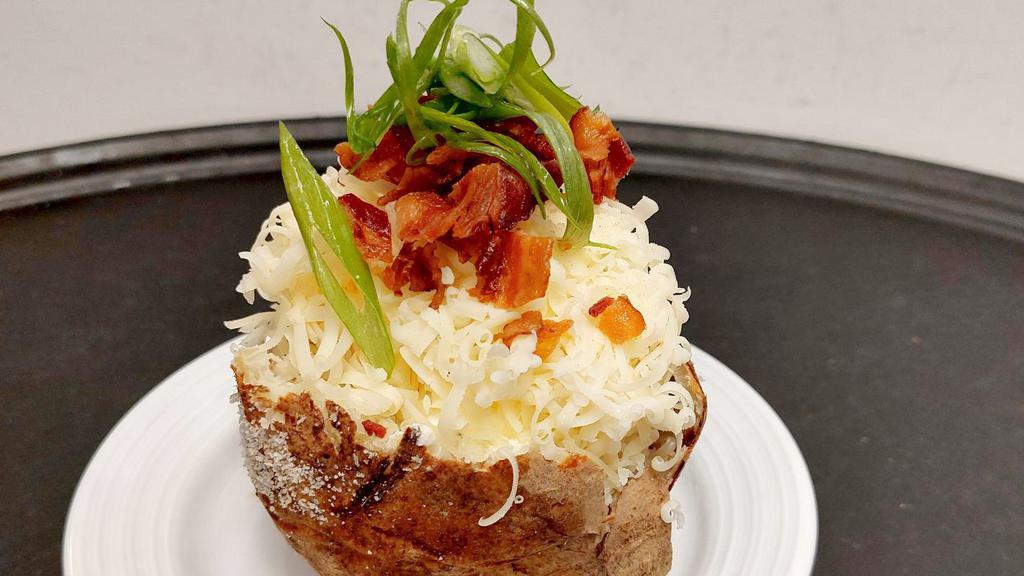 Fully Loaded Baked Potato · Cheddar, Sour Cream, Bacon, Scallions