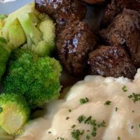 Steak Tips · Chef's  marinade steak tips served with  mashed potatoes & steamed broccoli 

(Gluten Free)