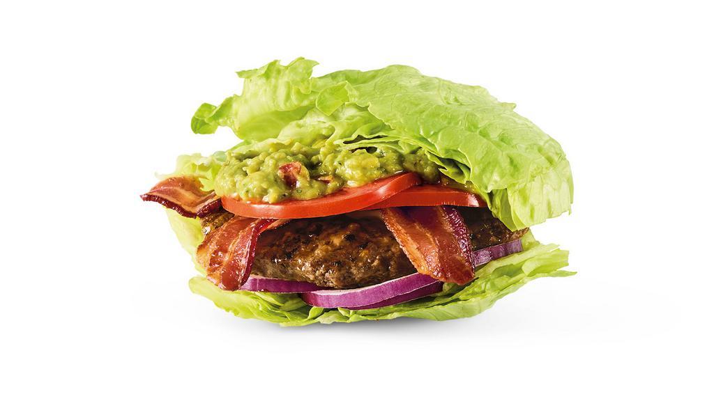 The Wedgie™ Burger · Hardwood-smoked bacon, housemade guac, tomatoes, and red onions in a lettuce bun. Served with a  side salad. 560 cal.