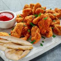 Chick-N-Sticks · Breaded chicken breast cubes with a side of Yeeroh sauce or homemade marmelade.