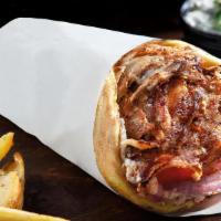 Sandwich · Grilled pita and your choice of spread, stuffed with our delicious meat, your choice of topp...