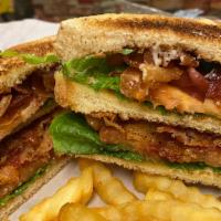 Blt Club Sandwich · Double layer sandwich with lettuce, tomatoes, bacon and, mayo.