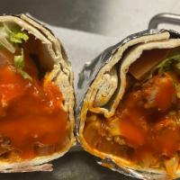 Buffalo Chicken Wrap · Crispy chicken breast strips with buffalo sauce, cheese, lettuce and red onion in a soft, to...