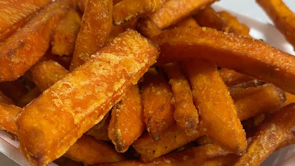 Sweet Potato Fries · Sweet potato fries with house seasoning and paprika. A real crowd pleaser.