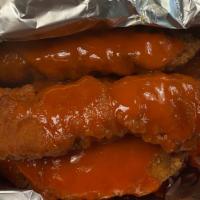 Buffalo Fingers · Chicken fingers breaded and fried, then tossed in buffalo sauce.