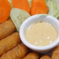 Mozarella Sticks (Veg) · Cheese coated in a breaded crumb mixture and deeply fried for crispy taste served with ranch...