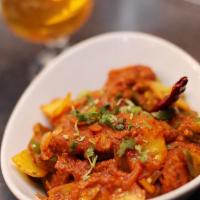 Gobi Manchurian (Vegan) · Marinated deep fried cauliflower marinated in herbs and spices cooked with onion, bell peppe...