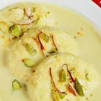Ras Malai (3 Pieces) · Fresh homemade cheese patties, cooked in a milk syrup, almonds and nuts.