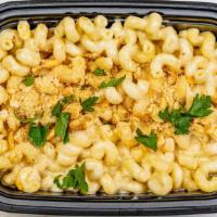 House Baked Mac & Cheese · House-made cheese sauce, cavatappi pasta, and cheesy bread crumbs. Add buffalo chicken for a...