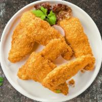 Classic Chicken Fingers · Chicken fingers breaded and fried until golden brown.