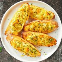 Cheesy Boolean Garlic Bread · (Vegetarian) Housemade bread toasted and garnished with butter, garlic, mozzarella cheese, a...