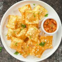 You'Re The Ravi-Only For Me · (Vegetarian) Cheese-filled ravioli breaded and fried until golden brown. Served with housema...