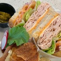 Hot Station Sandwich · Spicy. Turkey, American cheese, romaine, tomato, red onion, hot pepper, spicy mayo on your c...