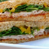 Philly Sandwich · Turkey, tomato, cucumber, cream cheese, honey mustard on your choice of bread. Comes with ch...