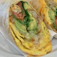 Sumatra Breakfast Wrap · 2 Eggs (scrambled), American cheese, hashbrown, avocado, spinach, tomato and spicy mayo on p...