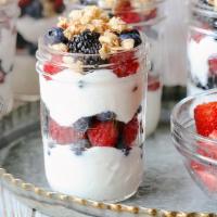 Yogurt Parfait · Low-fat vanilla yogurt, fresh berries, granola, honey. Available in 16oz. cup only.