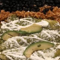 Enchilada · 3 flour corn tortilla, rolled with your choice of  meat topped with green sauce, queso fresc...