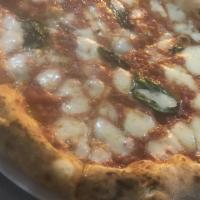 Margherita Pizza · Favorite. Tomato, basil and fresh mozzarella.
