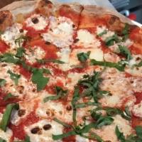 Margherita  Pizza · homemade tomato sauce, mozzarella , basil