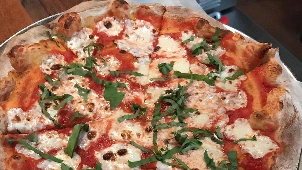 Margherita  Pizza · homemade tomato sauce, mozzarella , basil