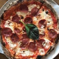 Carmine  Pizza · homemade tomato sauce, mozzarella, soppresata, garlic, basil