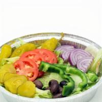Garden Salad · Crispy iceberg lettuce, tomatoes, onions, green peppers, cucumbers, Kalamata olives & pepper...
