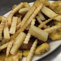 Meat Sampler /  Picadera Caribeña · Fried pork skin, beef, chicken, sausages, green plantains, fried yuca, French fries /  chich...