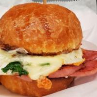 Breakfast Sandwich! · Breakfast sandwiches on house made buttermilk biscuits or brioche bun. Sandwich comes with a...