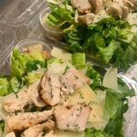 Caesar Salad · Romaine lettuce with croutons, shaved Parmesan, and Caesar dressing.