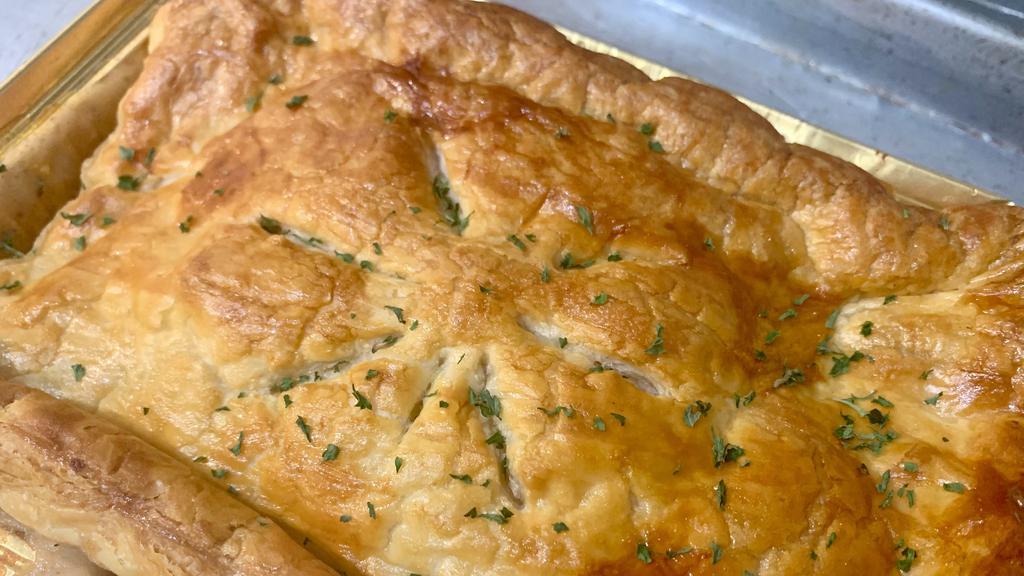 Chicken Pot Pie · Our Homemade Chicken Pot pie mixture topped with Puff pastry