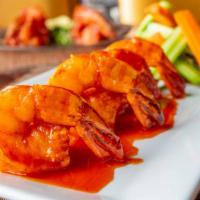 Grappa Shrimp · Jumbo shrimp smothered in our delicious tuscan grappa infused buffalo sauce. Accented with b...