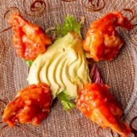 Shrimp Elegante · Four Jumbo shrimp in a salsa of tomato, lime, red onion, serrano peppers, avocado with a kis...