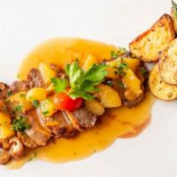 Sicilian Duck · Wood-roasted duck topped with our Sicilian orange sauce, flambeed with grand marnier.