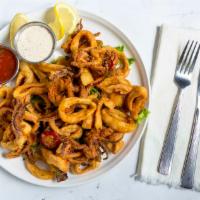 Fried Calamari · Crispy fried calamari tossed with hot cherry peppers served with Asiago and marinara dipping...