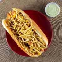 Hot Dog  · Pão, salsicha, presunto,mozarela , milho, batata palha e vinagrete.