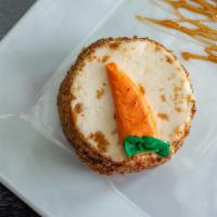 Carrot Cake · Sweet and moist spice cake, full of cut carrots and toasted nuts, and covered in cream chees...