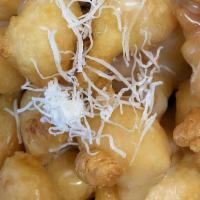 Coconut Shrimp · Deep Fried Battered Shrimp With Shredded Coconut Stuffing And  Sweet Cream Coconut Sauce. Se...