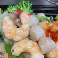 Seafood Delight · Lobster, fresh jumbo shrimp, scallops, king crab meat sautéed with Chinese vegetable