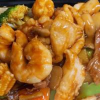 Triple Delight · Shrimp, chicken and beef with assorted vegetable