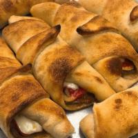 Pizza Roll Trays (6 Pieces) · Sausage, chicken, steak or any combo. Made your way!