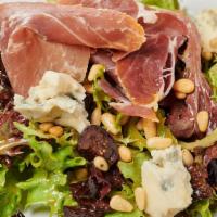 Fig And Gorgonzola Salad · Black Mission Figs and Gorgonzola with Prosciutto di Parma, Pine Nuts and Balsamic Vinaigrette