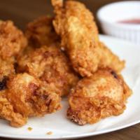 Bbq Wings · Deep­-fried saucy & crispy chicken wings in BBQ sauce.