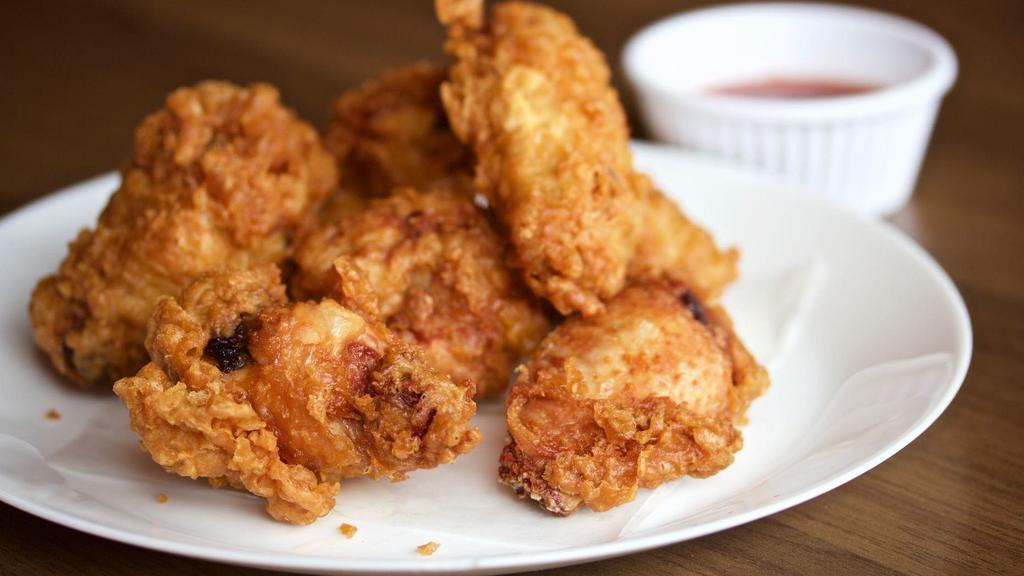 Bbq Wings · Deep­-fried saucy & crispy chicken wings in BBQ sauce.