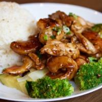 Teriyaki · Stir­-fried meat, broccoli, carrot, cabbage & teriyaki sauce.